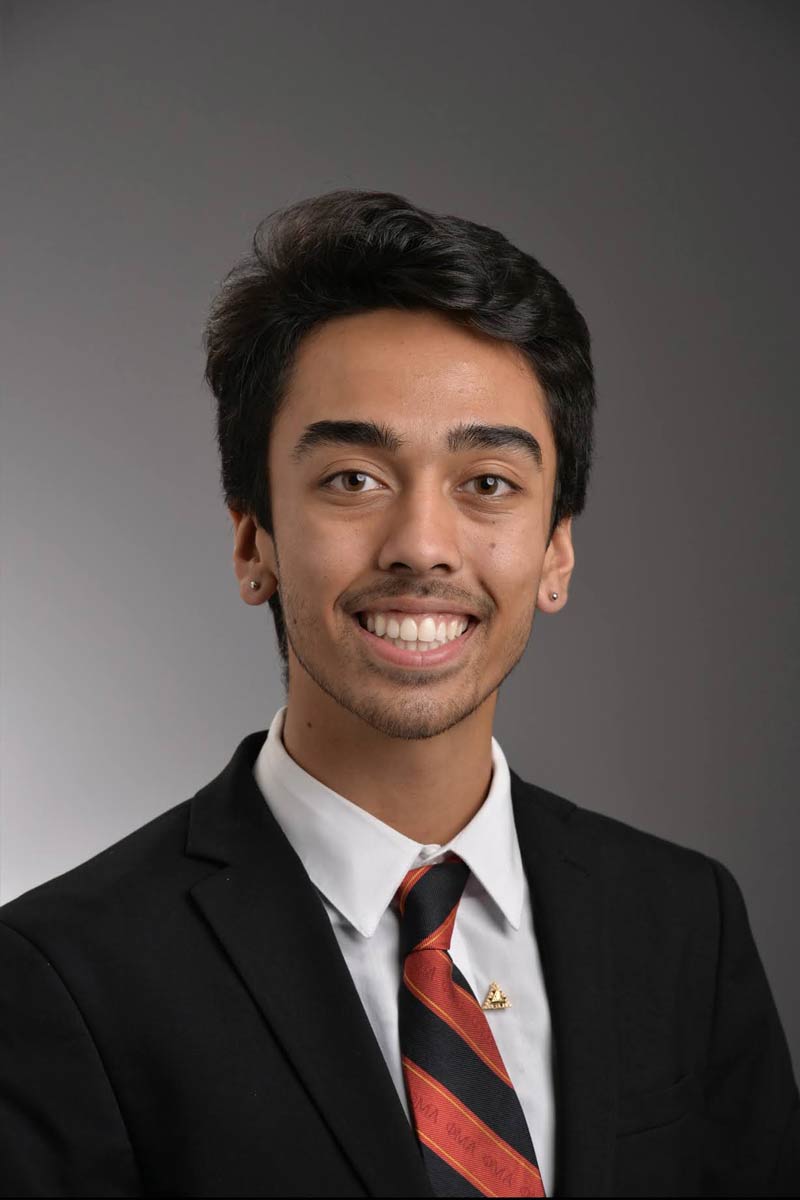 Three quarters portrait of a young professional man